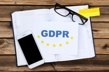 General Data Protection Regulation, GDPR with notepad and smartphone