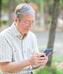 Older man use cellphone