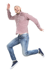 Jumping young man on white background