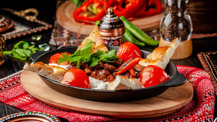 Traditional Turkish, Arabic cuisine. Ali Nazik Kebab. Chopped  lamb with eggplant, yogurt and garlic. Ottoman food. Serving dishes in the restaurant. copy space