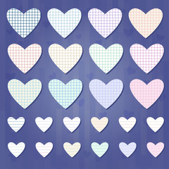 Set of paper checkered and striped paper hearts on darl blue background