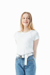 Obraz premium happy teenage girl looking away isolated on white