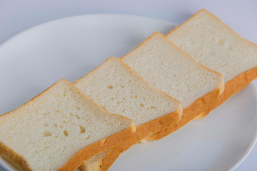 closeup bread in a white plate