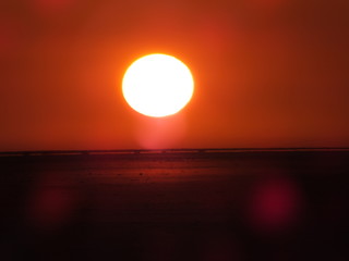 Fototapeta na wymiar sunset over the sand