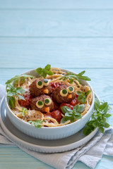 Pasta spaghetti with funny meatballs for kids. Birds in nests