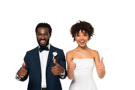 happy african american bridegroom and bride showing thumbs up isolated on white