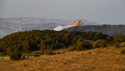 Putting out a fire with a plane