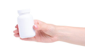White jar of pills medicine pharmacy in hand on white background isolation