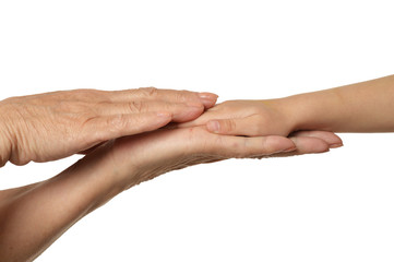 grandmothers hands with little girl hands isolated on white background