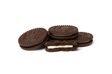 Chocolate cookies with milk filling isolated on white background.