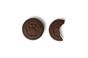 Chocolate cookies with milk filling isolated on white background.