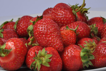 Red fresh strawberry isolated on the white