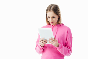 smiling teenage girl using digital tablet isolated on white
