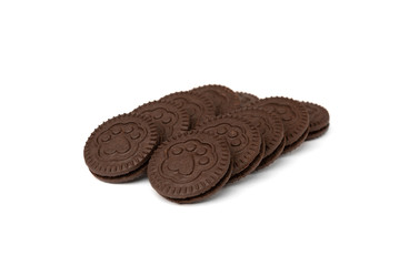 Chocolate cookies with milk filling isolated on white background.
