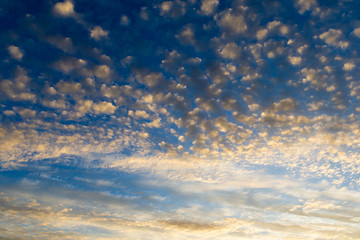 Colorful sunset sky over tranquil sea surface
