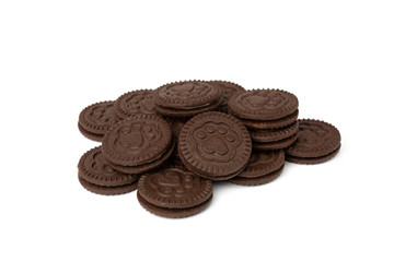 Chocolate cookies with milk filling isolated on white background.