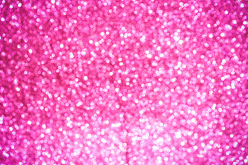 pink Sparkling Lights Festive background with texture. Abstract Christmas twinkled bright bokeh defocused and Falling stars. Winter Card or invitation