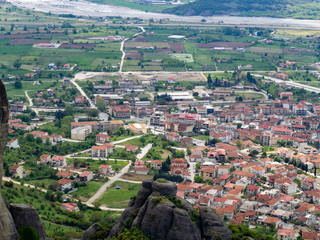 View of the red roofs of the Kalambaka town from the Meteora rocks, Greece.