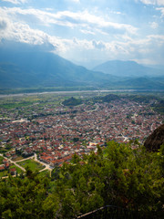 View of the red roofs of the Kalambaka town from the Meteora rocks, Greece.