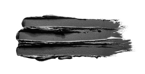 Texture of black crushed eyeliner or black acrylic paint