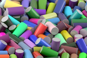 Abstract background of randomly arranged colored glossy cylinder