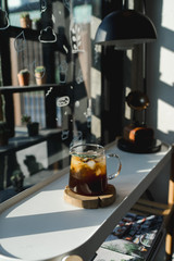 Cold brew coffee and black tea in a jar