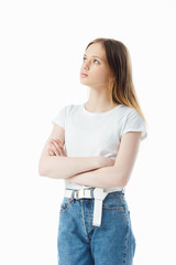 Fototapeta premium upset and offended teenage girl with crossed arms looking away isolated on white