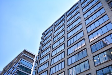 Fototapeta premium The windows of a modern building for offices. Business buildings architecture.