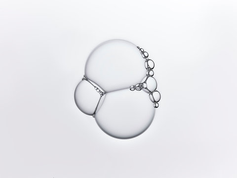 Three clear bubbles stuck together