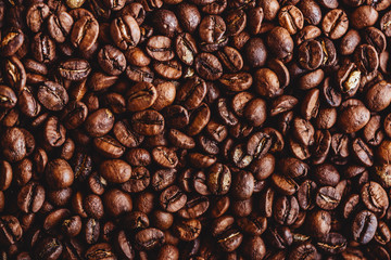 Coffee grains. Background of roasted coffee beans brown. layout. Flat lay.