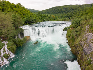 Fototapeta na wymiar Strbacki buk (Štrbački buk) waterfall is a 25 m high waterfall on the Una River. It is greatest waterfall in Bosnia and Herzegovina.