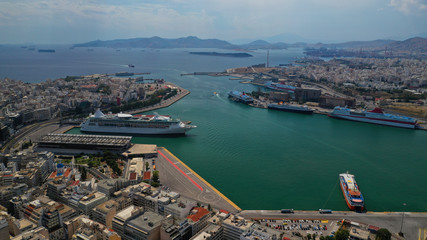 Obraz premium Aerial panoramic view of famous port of Piraeus one of the largest and busiest in Mediterranean sea where passenger ships travel to Aegean destinations, Attica, Greece