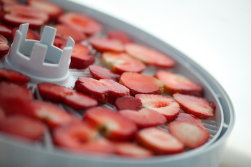 Strawberry berries cut dry plastic grid dryers