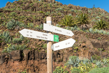 Signpost in the highlands of La Gomera. On the trail from the village El Cercado down the Argaga ravine to the Valle Gran Rey