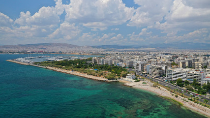 Aerial panoramic photo of famous seaside bay of Faliro with beautiful emerald sea, clouds and deep...