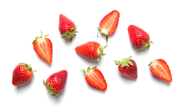 Ripe strawberries isolated on white background, berry pattern, top view