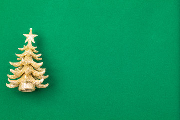 Golden Xmas tree on green