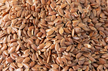 Flax seed background. Textured surface.