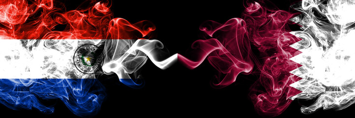 Obraz premium Paraguay, Paraguayan, Qatar, Qatari, flip, competition thick colorful smoky flags. America football group stage qualifications match games