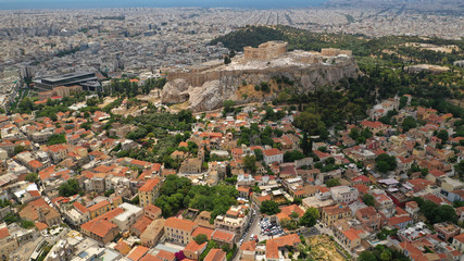 Fototapeta na wymiar Aerial photo of Athens Metropolis urban area and iconic Acropolis hill and the Parthenon, Attica, Greece