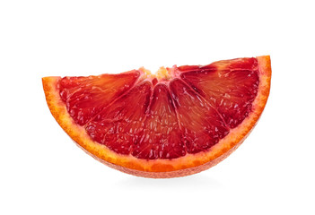 Juicy slice of Sicilian orange fruit isolated on white background