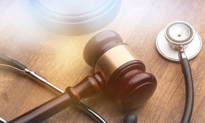 Stethoscope and judgement hammer.