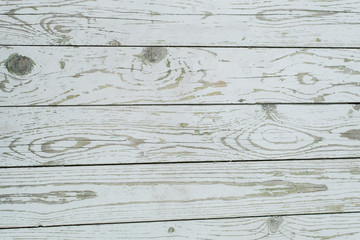 gray wooden background of several boards. wooden table, top view.
