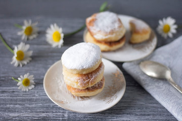 A pile of cheesecakes on a white plate
