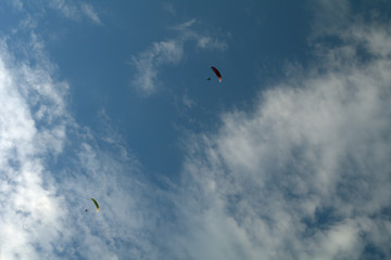 kite in the sky,parachute, paragliding, sport, fly, blue, paraglider, flying,clouds, air, extreme,...