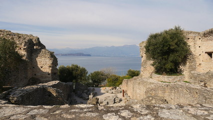The ruins of a Roman villa in Sirmione, located in Italy, right on the shore of the lake.