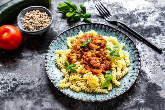 Spirelli with vegetarian bolognese, sunflower mince, zucchini, tomato, parmesan and basil