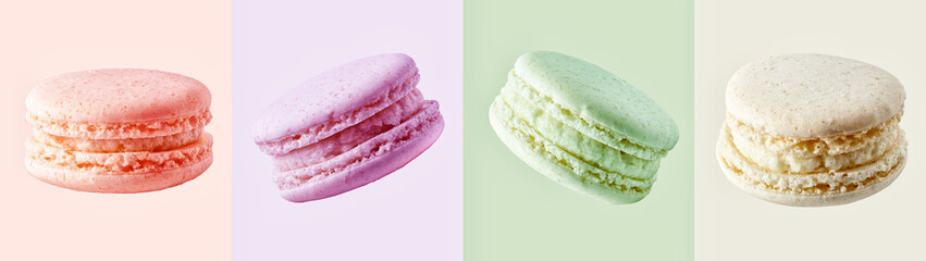 Colorful french cookies macarons set, isolated on colored background. Tasty fruit, almond sweet cookies macarons cakes with focus stacking. Full depth of field. Dessert design elements