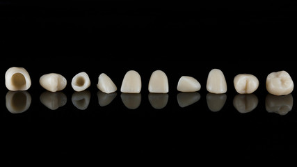 Dental crown of graphene, shot on a black background
