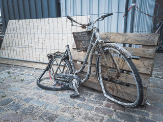 Fototapeta na wymiar Woman recovered bicycle from water Copenhagen city summer time